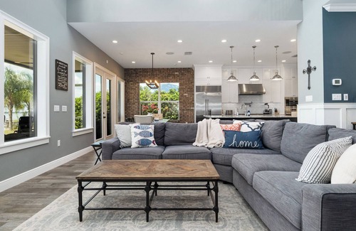 Candler House | Blue Haven on Lake Weir with white sandy beach and fishing off of the dock