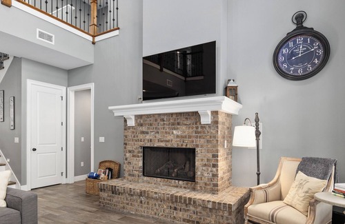 Candler House | Blue Haven on Lake Weir with white sandy beach and fishing off of the dock
