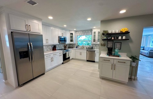 Ruskin House | Blue Heron House | Private 4 BR Waterfront w/Heated Pool and Fire Pit