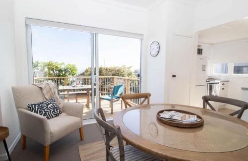 Rewa House | Blue Water Cottage - with beachfront coastal views
