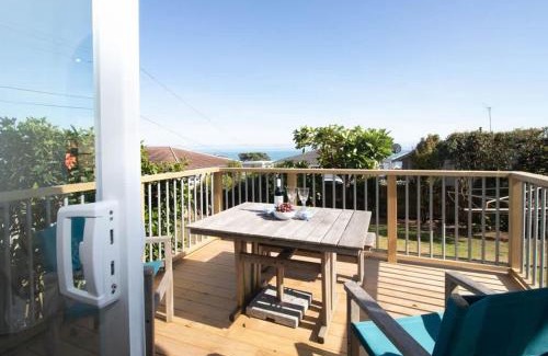 Rewa House | Blue Water Cottage - with beachfront coastal views