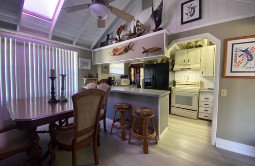Palm City House | Boathouse with Captains Cabin