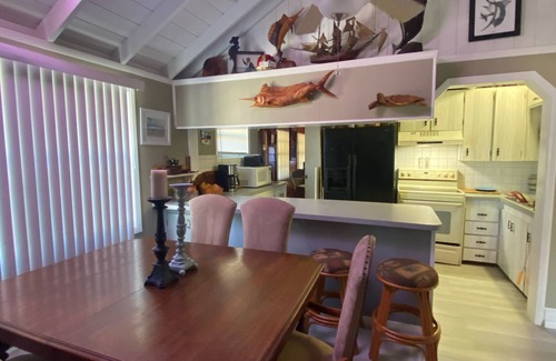 Palm City House | Boathouse with Captains Cabin