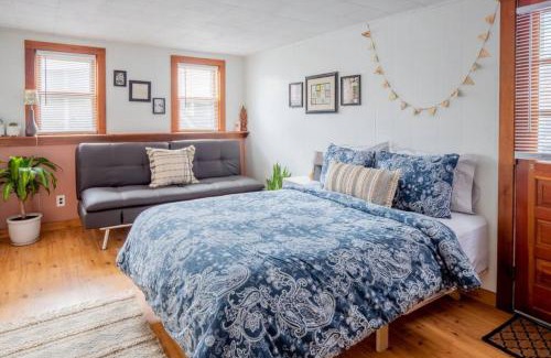 Winooski Falls Mill District Apartment | Bohemian Bungalow with Hot Tub