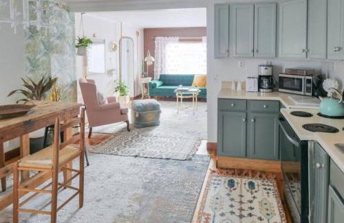 Winooski Falls Mill District Apartment | Bohemian Bungalow with Hot Tub