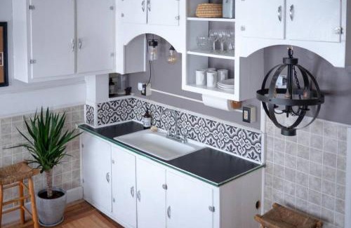 Winooski Falls Mill District Apartment | Bohemian Compound with Hot Tub