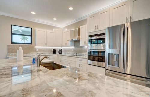Burnt Store House | Brand New 5 Bedroom Heated Pool Home with 6 Beds