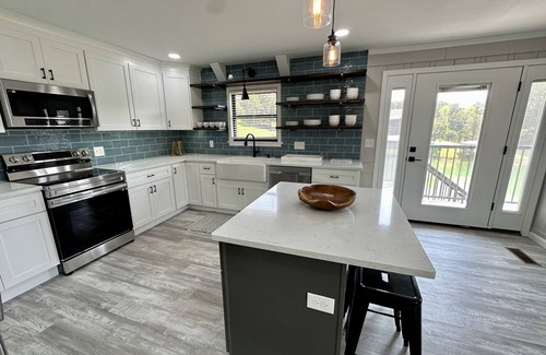 Sevierville Cabin | BRAND NEW Lake Front home. Private cove and boat dock! Modern farmhouse appeal!