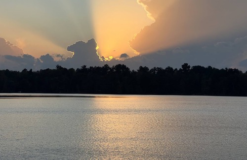 Arbor Vitae House | Brandy Old Fashion is situated on the beautiful Brady Lake!