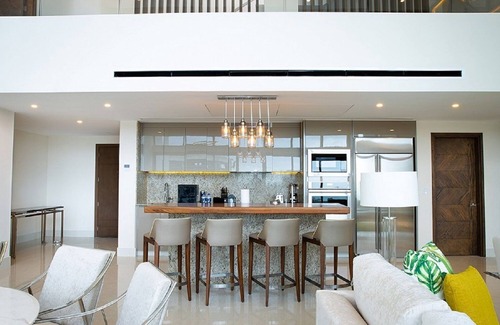 Playa Mujeres Condo | Breathtaking Views, Infinite Luxury: 4BR Loft PH at Garza Blanca Cancun