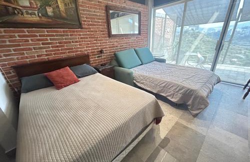 Queretaro Apartment | Brick Box Studio con Terraza