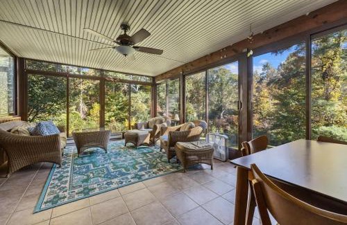 Hendersonville House | Bright 2BR Cabin with Sunroom Firepit Near Trails