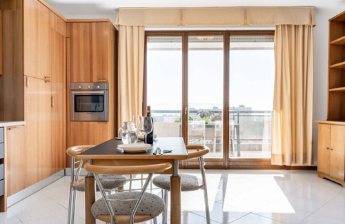 Ponte San Giovanni Apartment | Bright 80 sqm apartment that can accommodate up to 6 people, located near the Ponte San Giovanni station. It consists of a living room with kitchen and dining area, a bathroom and two bedrooms. The flat is located on the ninth floor and has a large terra
