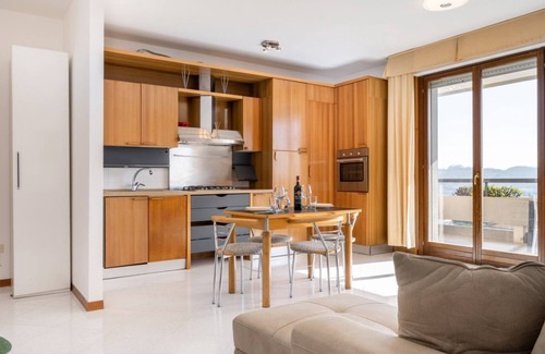 Ponte San Giovanni Apartment | Bright 80 sqm apartment that can accommodate up to 6 people, located near the Ponte San Giovanni station. It consists of a living room with kitchen and dining area, a bathroom and two bedrooms. The flat is located on the ninth floor and has a large terra