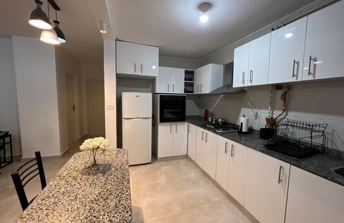 Al Rehab Apartment | Bright Al Rehab 2-BR Apt w Garden - Walk to Food Court & Old Market