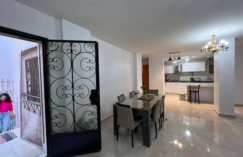Al Rehab Apartment | Bright Al Rehab 2-BR Apt w Garden - Walk to Food Court & Old Market