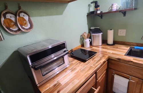 Walnut Grove Apartment | Bright and private basement studio with full laundry in rental.