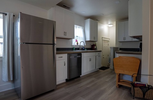 Casper House | Bright and stylish 2-bed bungalow in Casper with modern kitchen, updated bath, fenced yard. Minutes from downtown, Platte River, and outdoor adventures.
