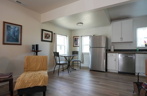 Casper House | Bright and stylish 2-bed bungalow in Casper with modern kitchen, updated bath, fenced yard. Minutes from downtown, Platte River, and outdoor adventures.