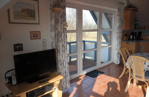 Dornum Apartment | Bright apartment (70 sqm) with all-round views right on the bottom - fishing, free Wi-Fi
