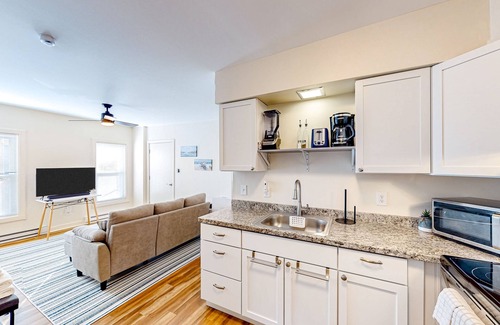 Glens Falls Apartment | Bright apartment with large covered balcony - steps to town
