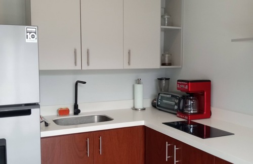 Canafistula Apartment | Bright Casita in Gated Loma Verde with Pool, AC & Short Drive to Beaches