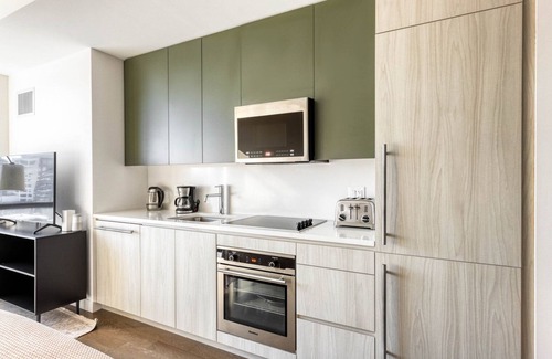 Fenway–Kenmore Apartment | Bright Fenway Studio w/W/D, Roof & Gym, nr Fenway Park, by Blueground