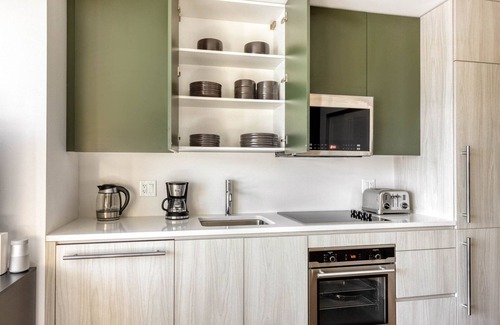 Fenway–Kenmore Apartment | Bright Fenway Studio w/W/D, Roof & Gym, nr Fenway Park, by Blueground
