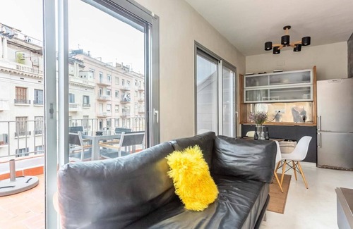 El Putget i Farro Apartment | Bright just renovated attic apartment with two private terraces for 4