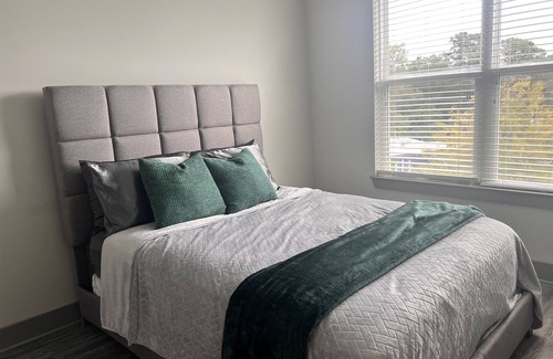 Lindridge-Martin Manor Apartment | Buckhead Retreat with full access to pool, roooftop, gym and parking garage.