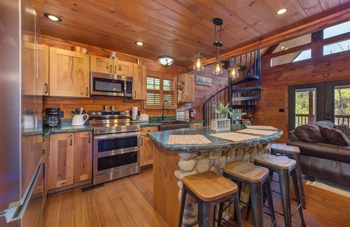Chalet Village North Cabin | Buckhorn Cabin - a deer themed, two bedroom 2.5 bath luxury cabin.