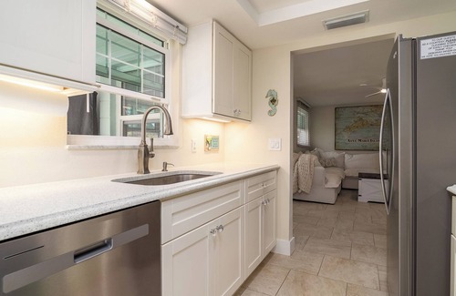 Holmes Beach House | Buddy’s Beach House Private Heated Pool and Spa- Pet Friendly