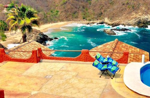 Puerto Angel Villa | Bungalow frente a la playa estrene alberca nueva con increíble vista infinita al mar, 8 hermosas playas cercanas, terraza con cama de playa, espectacular vista al inmenso océano pacífico, 2 kayack disponibles, nómadas digitales Starlink WiFi 224 mbps