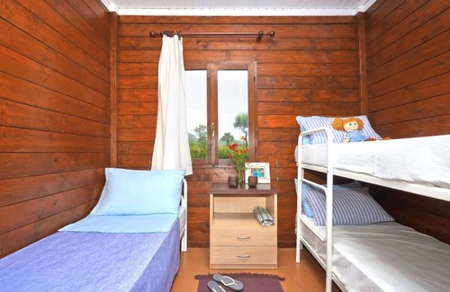 Baia Domizia House | Bungalow in legno by Interhome
