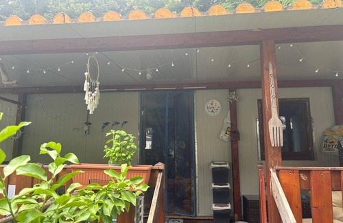 Ameglia House | Bungalow 'Stefy- Ameglia' with Shared Pool, Shared Garden and Air Conditioning