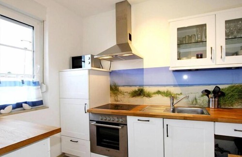 Dornumersiel House | Bungalow sunbathers, Dornumersiel