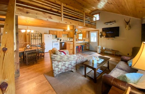 Hayward House | Burns Lake Cabin with Dock, Fire Pit, Rowboat and More