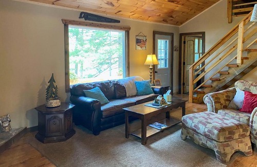 Hayward House | Burns Lake Cabin with Dock, Fire Pit, Rowboat and More