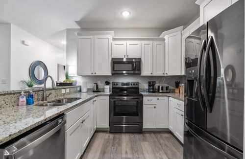Myrtle Beach Apartment | C · Modern 4BR Ground Level King Beds Steps 2 Beach #C