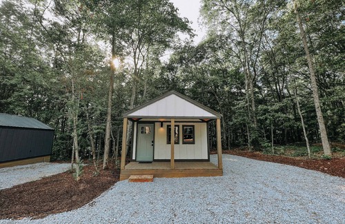 Hartwell Apartment | Cabin #1: Studio style layout with kitchenette and a large gravel parking pad beside the cabin for easy boat or trailer storage.