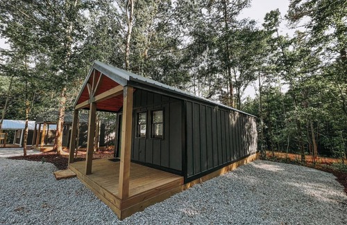 Hartwell RV Rental | Cabin #6: Studio style layout with kitchenette and a large gravel parking pad beside the cabin for easy boat or trailer storage.