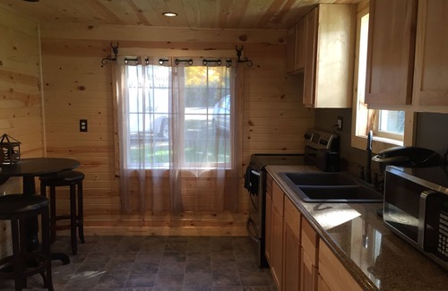 Luck House | Cabin getaway in Luck blocks from Big Butternut Lake and golf course