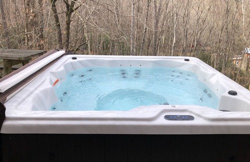 Maggie Valley Cabin | Cabin with hot tub in the mountains with creek.