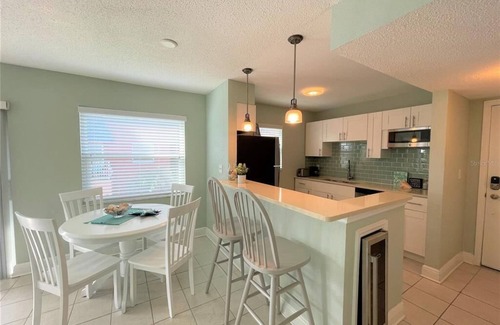 North Redington Beach Condo | calming coastal condo walkway to beach.