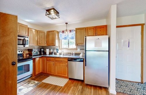 Village at Camelback House | Calming mountain-view home with pool access, game room, grill, & balcony