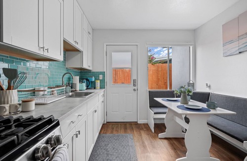 Pierpont Bay Apartment | Calypso Breeze, Hot Tub, Fire Pit, Games, 2 King Bed, 1 Minute Walk to the Beach
