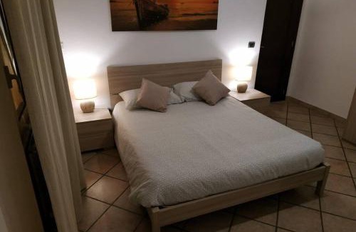 Zona XXXII Acilia Nord Apartment | Camera confortevole tra Roma e Ostia