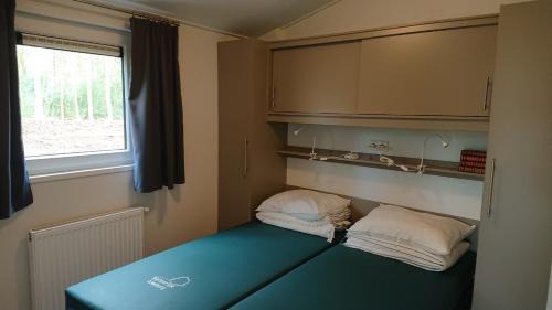 Remersdaal Ski Chalet | Camping Natuurlijk Limburg - chalet 4p