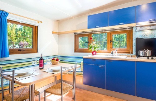 Fertilia House | Camping Village Laguna Blu by Interhome