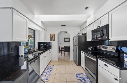 Port Charlotte House | CANAL HOME! WARM PRIVATE POOL! FAMILY MEMORIES! WIFI! GRILL! BABY SUPPLIES!